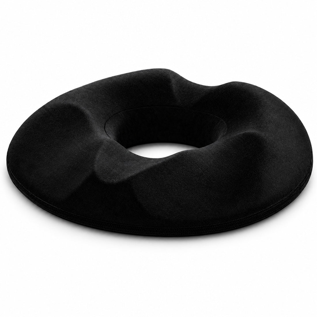 Svart donutkudde i memory foam med hål i mitten