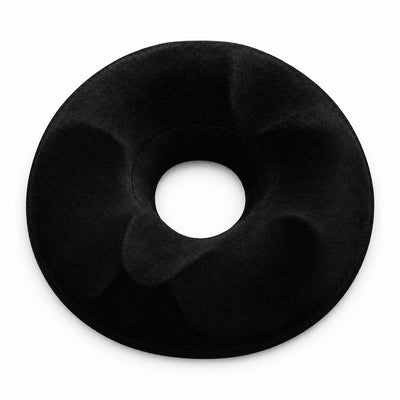 Donutkudde sedd rakt uppifrån med centralt hål