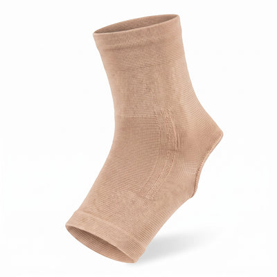 Beige elastiskt kompressionsstöd för fotleden på vit bakgrund