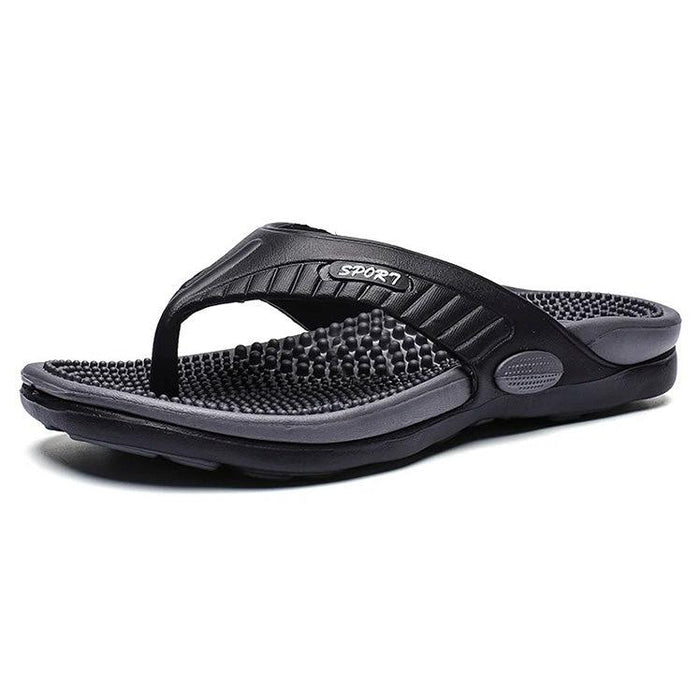 Svarta flip flops med massagesula och grå kant