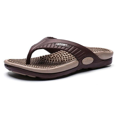 Bruna flip flops med noppig massagesula och tåsteg