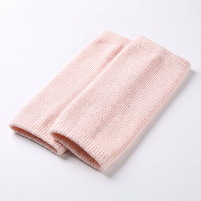 Vikt par rosa ribbstickade knävärmare