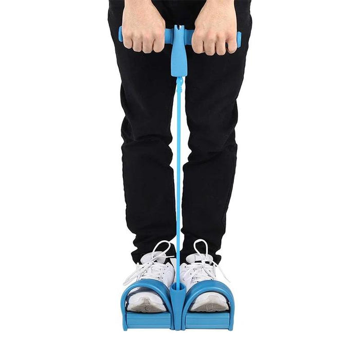 In-use shot: hands gripping handles, feet in pedals, blue band