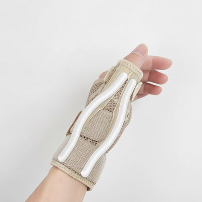 Beige håndledsbandage, der viser dobbelte PP-stabiliseringsskinner