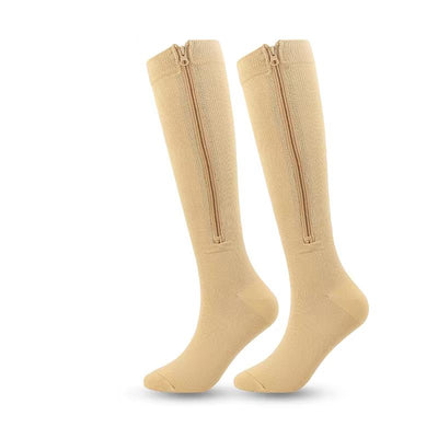 Beige knähög kompressionsstrumpa med dragkedja fram