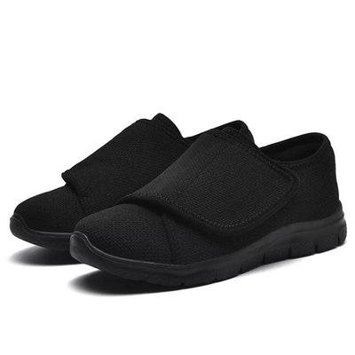 Sorte mesh-sko med velcro, par på hvid baggrund, hovedbillede