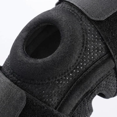Close-up of breathable mesh material and open patella hole