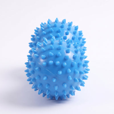 Avlång massageboll sedd från änden som visar den jordnötsformade midjan
