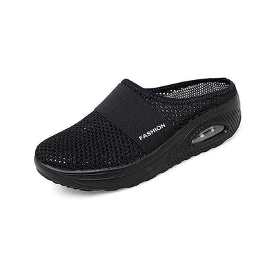 Svart stötdämpande slip-on-toffel med luftsula